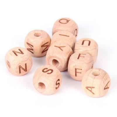 China DIY Material Custom Cube In Place Letter Beads Beech Wooden Loose Bead Alphabet Letter Beads for sale