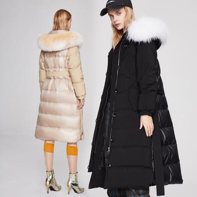 China OEM Custom Made Slim Fit Patchwork Puff Jacket Women Winter Fabric Fox Fur Neck Beige And Black Belt Waterproof Long Bend Down Coat for sale