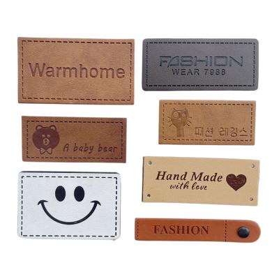 China Viable Factory Price Good Factory Price Direct High Quality China Jean PU Patch Custom Label Embossed Leather Labels For Garment Clothing for sale