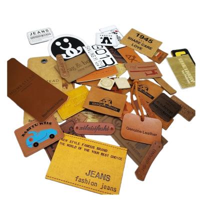 China Hot Sale Factory Direct Selling Sustainable Good Quality PU Patch Label Embossed Labels Mask Leather Patches For Clothes And Bags for sale