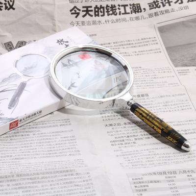 China Magnification 90MM Dragon Pattern Metal Magnifier Handheld Magnifying Glass Elderly Students Reading High Definition Magnifying Glass for sale