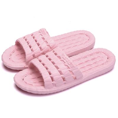 China New fashion trend home slippers hollow soft bottom non-slip bathroom slippers men's and women's couples leak slippers for sale