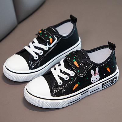 China Lovely Breathable Comfortable Casual Wholesale Kids Running White Shoes And Back Canvas Shoes for sale