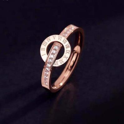 China Custom Logo Wholesale Fashion Women Jewelry Rings Rose Gold Plated Engraved Roman Numeral Around Zircon Plated Ring for sale