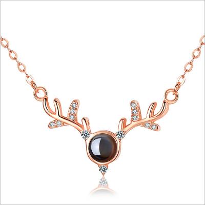 China Charm Trendy Reindeer Elk Antler Elk Horn Rose Gold Brass Material Animal Jewelry Pendant Necklace For Women for sale