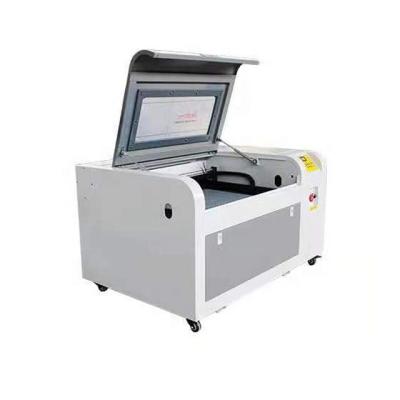 Cina 6090 CO2 Laser Electric Engraving Machine For Metal And Nonmetal Laser Engraving in vendita