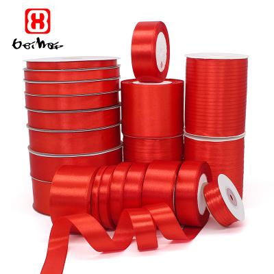 China High Tenacity Factory Wholesale Hot Sale 100% Polyester Stocked Many Sizes Choose Satin Faced Red Ribbon For Festival Weeding Party for sale