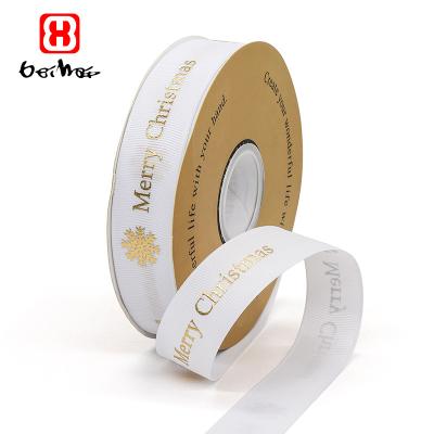 China High Tenacity Customized White Christmas Ribbon With Gold Foil Logo 100% Polyester Grosgrain Craft Ribbon For Christmas Gift Wrapping for sale