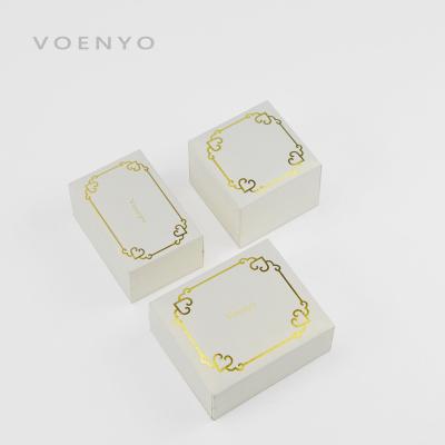 China Plastic Outside Custom Printing Logo Stamping Beige Jewelry Boxes With Filler Jewelry Set Luxury Packaging for sale