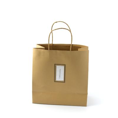 China Handmade Custom Size Brand Printing Strong Good Quality Packaging Bag Brown Kraft Paper Store Paper Bag For Clothing Packaging for sale