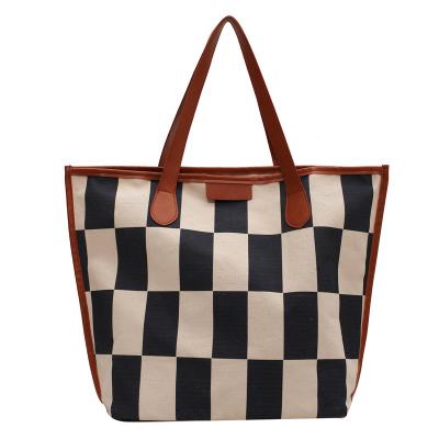 China 2022 PORTABLE Custom Large Capacity Bag Custom Female High Sense College Students Classify Bag Checker Canvas Tote Bag for sale