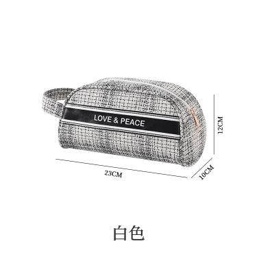 China Fashion Lady's Travel Lady's Travel Business Storage Bag Polyester Handbag Women Makeup Bag Polyester Makeup Skin Care Cosmetics for sale