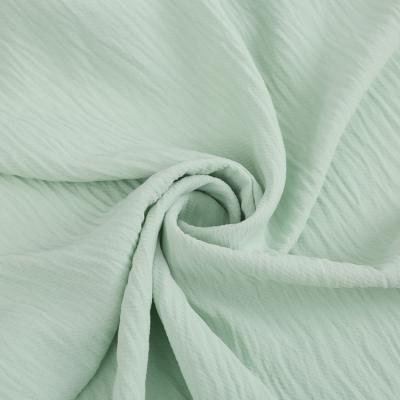 China Stretch solid colors custom high stretch chiffon dyeing plain dyed polyester air flow cey crepe fabric for sale