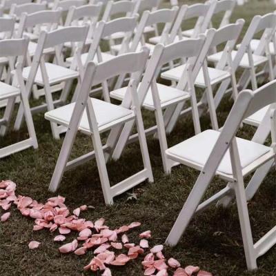 China Modern Design Modern Wimbledon Outdoor Padded White White Dining Plastic Resin Banquet Wedding Folding Chairs for sale