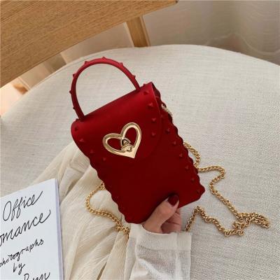 China 2021 New High Quality Cute Cell Phone Clips Case Small Cross - Body Women Jelly Handbags Tote Pvc Luxury Bags Jelly Mini Crossbody Bag for sale