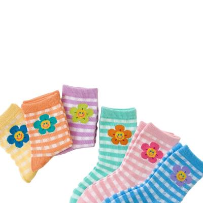 China New Arrival QUICK DRY kids thongs cartoon flower embroidery thongs mid light cotton tube socks for boys girls for sale