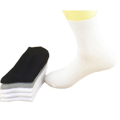 China 2021 new design solid color QUICK DRY white socks school children socks double needle cotton student tube mid for sale