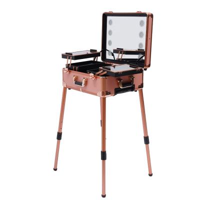 China Fashionable Makeup Train Case Lighted Bluetooth Speakers Makeup Station Box LED Aluminum Rolling Suitcase With Mirror for sale