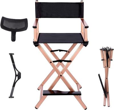 China Fashionable Durable Foldable Makeup Artist Chair Portable Tall Directors Chair Rose Gold Color Aluminum Makeup Folding Chair With Head Rest for sale