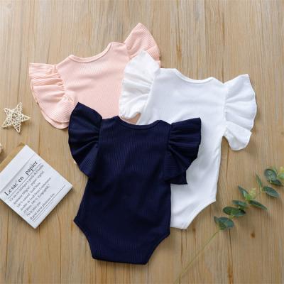 China Lovely Solid Color Cotton and Tulle Ruffle Baby Clothes Float Sleeve Romper with Matching Bow Headband for sale