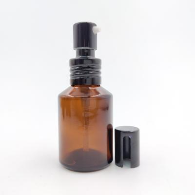 China Essential Oil 30ml Shoulder Spray Sloping Amber Glass Bottle for sale