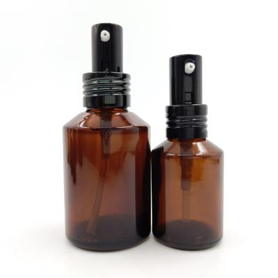 China Essential Oil Amber Spray 30ml Glass Empty Perfume Bottles With Black Cap for sale