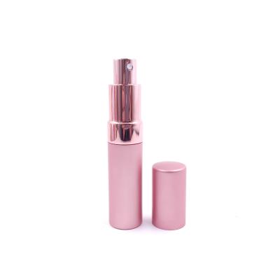 China 10ml 15ml 20ml Pink Chemical Mini Sample Perfume Empty Tube Cosmetic Spray Bottle for sale