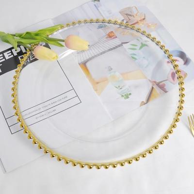 China Sustainable Clear Gold Beaded Acrylic Transparent Cheap Plastic Chargers Plates With Gold Rim 13 Inch Volume for sale