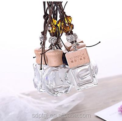 China Hanging Charging Essential Oil Perfume Eye Cream Diffuser Car Glass Bottle Air Freshener Perfume Home Empty for sale