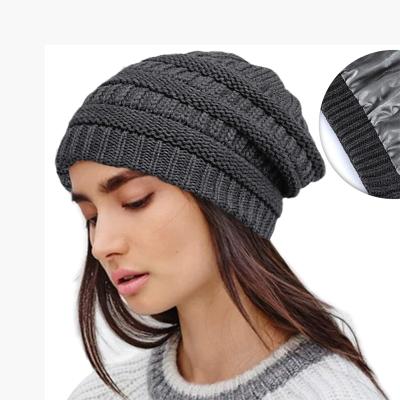 China COMMON Thick Cable Chunky Knit Winter Hats Slouchy Women Warm Satin Striped Beanie Custom Skully Beanie With Satin Lining for sale