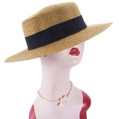 China 2022 Striped Beach Sun Summer Panama Know Bow Decor Women's Flat Top Gold Boater Straw Hat for sale