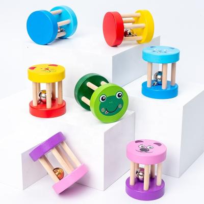 China Eco-friendly wholesale cartoon rattles toys wooden toys montessori musical instruments babyearly education for sale