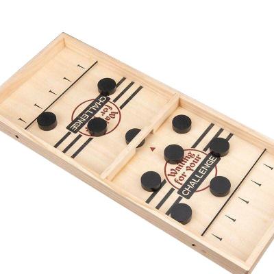 China Eco-Friendly Children's Indoor Games Bouncing Chess Table Wooden Ice Hockey Chess Puzzle Board Battle Bumper Toys for sale