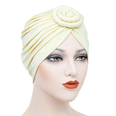 China UNIQ Fashionable UH002 Customized African Feminine Women Knotted Turban Spiral Single Solid Beanie Sleep Cap Muslim Hijab Hats Headwraps for sale