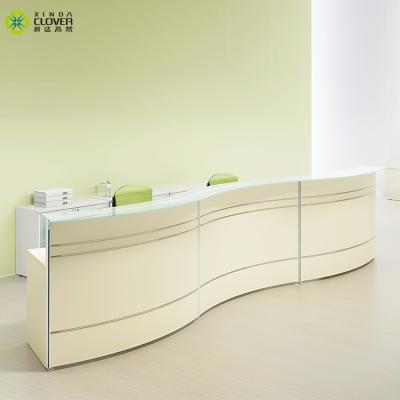 China Expandable Used Curved Partition Panel Office Counter Reception Table Modern Design for sale