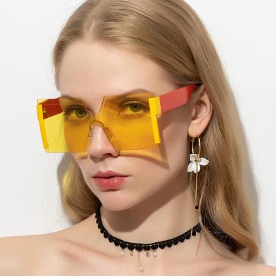 China Oversized Female Square Travel Fashion Flat Designer Brand Sunglasses Rimless Metal Frame One-Piece Sunglasses for sale