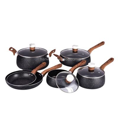 China 10pcs sustainable pressed wooden handle induction aluminum non-stick cookware for sale