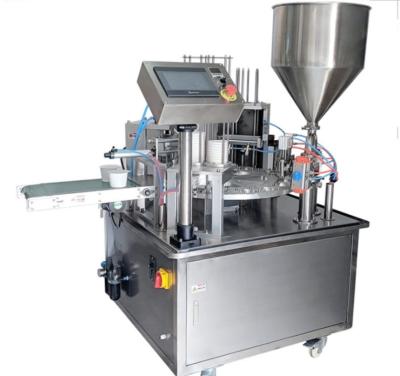 China Rotary Filling And Sealing Type Cheese Filling And Sealing Machine CLOTHING Atpack Cup Machine for sale