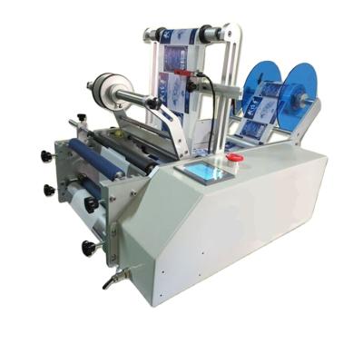 China CLOTHING Atpack Round Bottle Wine Bottle Labeling Machine Semi-automatic Labeling Machine With CE Certification for sale