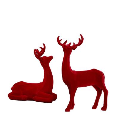 China Global Geometry Reindeer Gifts Resin Creative Flocking Decoration For Home Living Room for sale