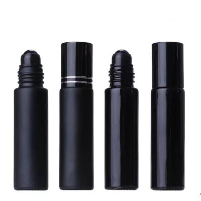 China LOW MOQ 10ml Cosmetic Black Glass Roll On Bottle Steel Roll Ball For Essential Oil for sale