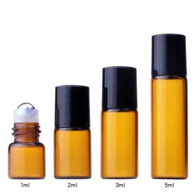 China 1ml 2ml 3ml 5ml Cosmetic Amber Glass Roll On Bottle With Cap For Essential Oil for sale