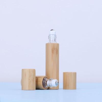 China 3ml 5ml 10ml Cosmetic Bamboo Roll On Bottle Essential Oil Bottle With Bamboo Cap for sale