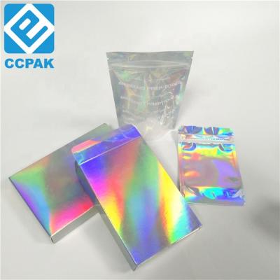 China Recycled Materials Eyelash / Nail Polish Hologram Paper Box Foil Packaging Holographic Bags With Adhesive Sticker for sale