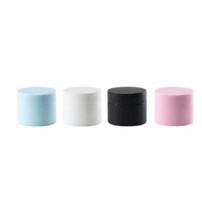 China 5g10g15g20g30g Double Wall Luxury Mini Cosmetic Scrub Cream Container 50g Matte White Black Pink Blue Plastic Cream Jar for sale