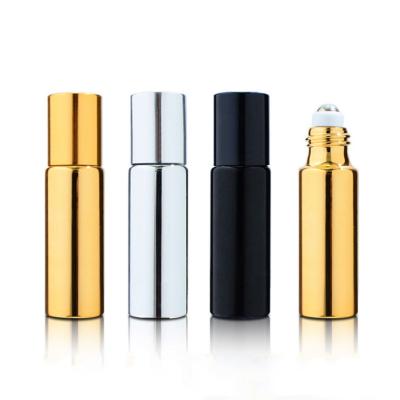 China Cosmetic Luxury 5ml Yellow Gold Silver Plated Glass Roll On Bottle, UV Coating Essential Oil Diffuser Bottle With Ball&Gold Steel Cap for sale