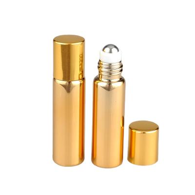 China Cosmetic UV Protection Shiny Gold Eye Cream Roll On Glass Bottle Perfume Roller Oil Bottle for sale