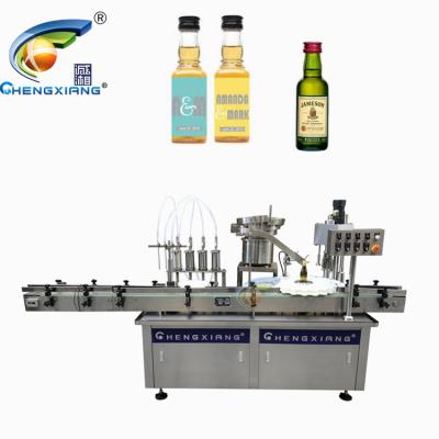 China Automatic wine food soft drink bottle monoblock filling and capping machine for sale