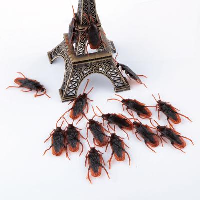 China Excellent quality from OurMall dropshipping 6*2cm simulation plastic rubber cockroaches funny ghost toys for sale