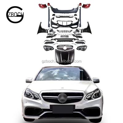 China Genuine PP Car Bumper For Mercedes W212 E Class Facelift E63S AMG Body Kit Headlights Talllights Hood Fender Diffuser Exhaust for sale